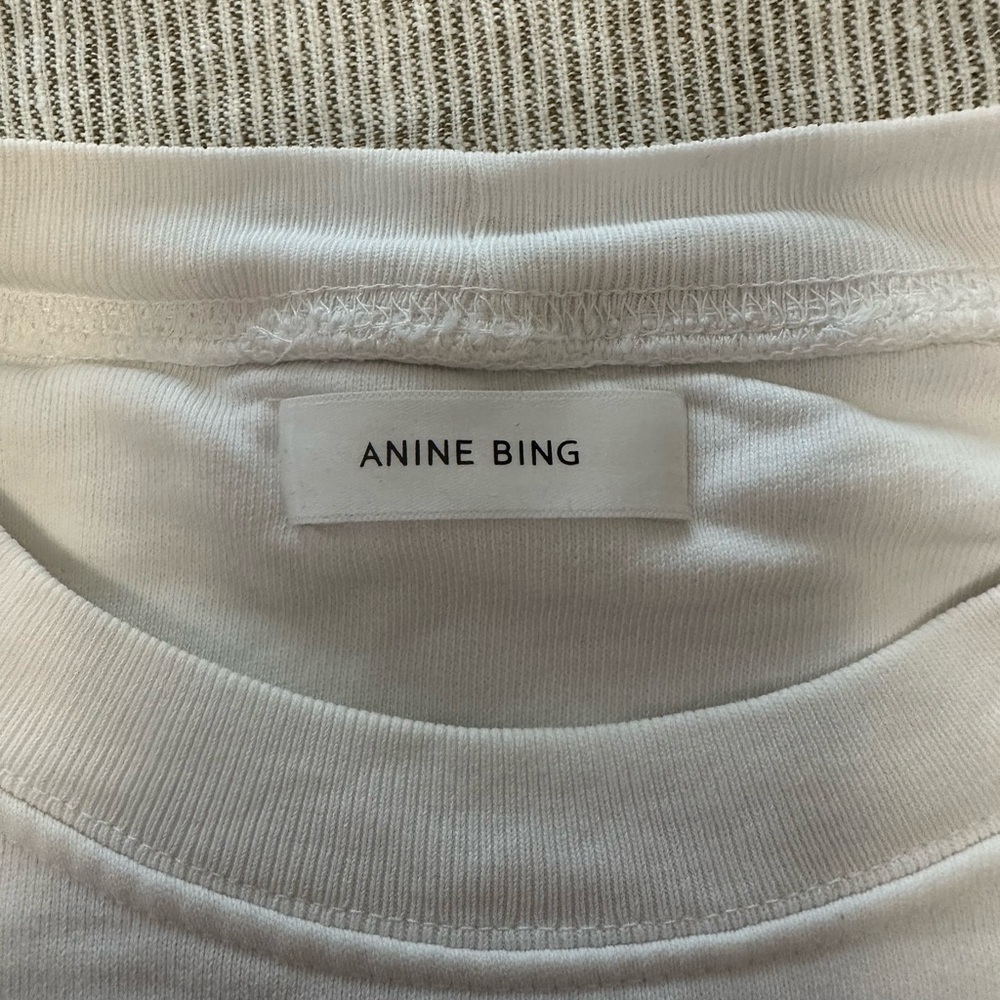 White sweatshirt worn once. - Picture 2 of 3